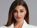 Outfit e tagli capelli, la minigonna a pieghe di Belen Rodriguez e la chioma lunga 